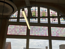 Stained glass on an arched window 